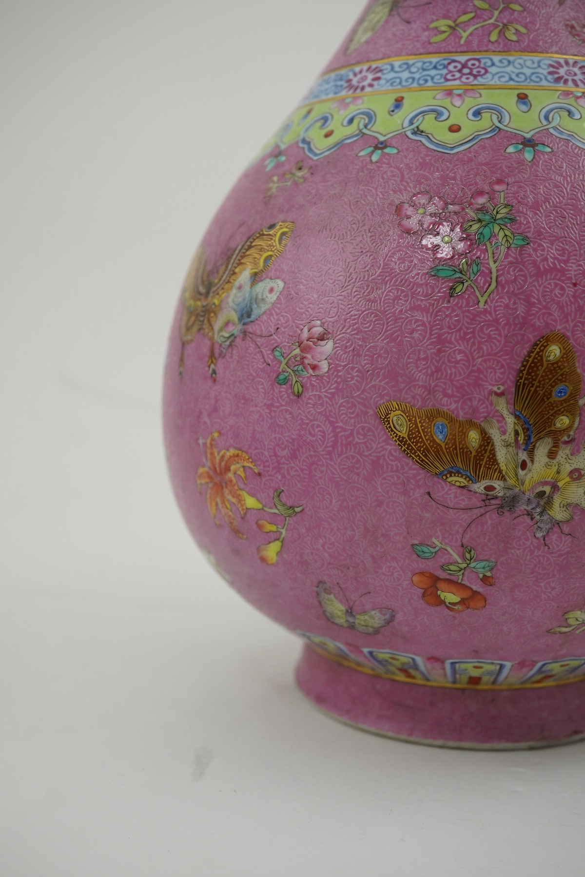 A Chinese pink-ground sgraffito pear-shaped vase, yuhuchunping, Daoguang six character seal mark and of the period (1821-50)
